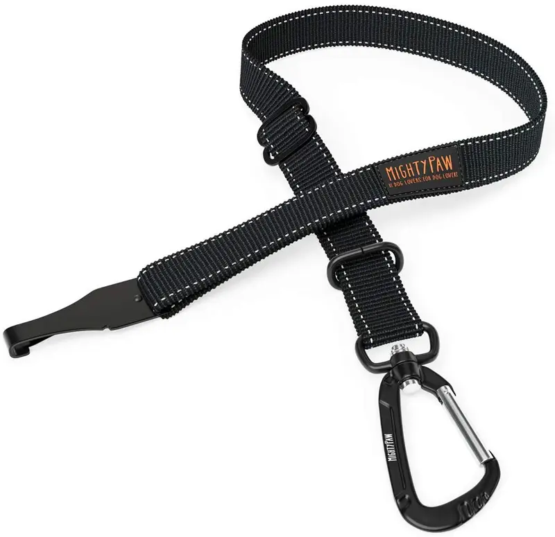 Cinturón de seguridad para perro, material resistente, incluyendo anexo de giro sin enredos, mosquetón y barra apego. De Mighty Paw