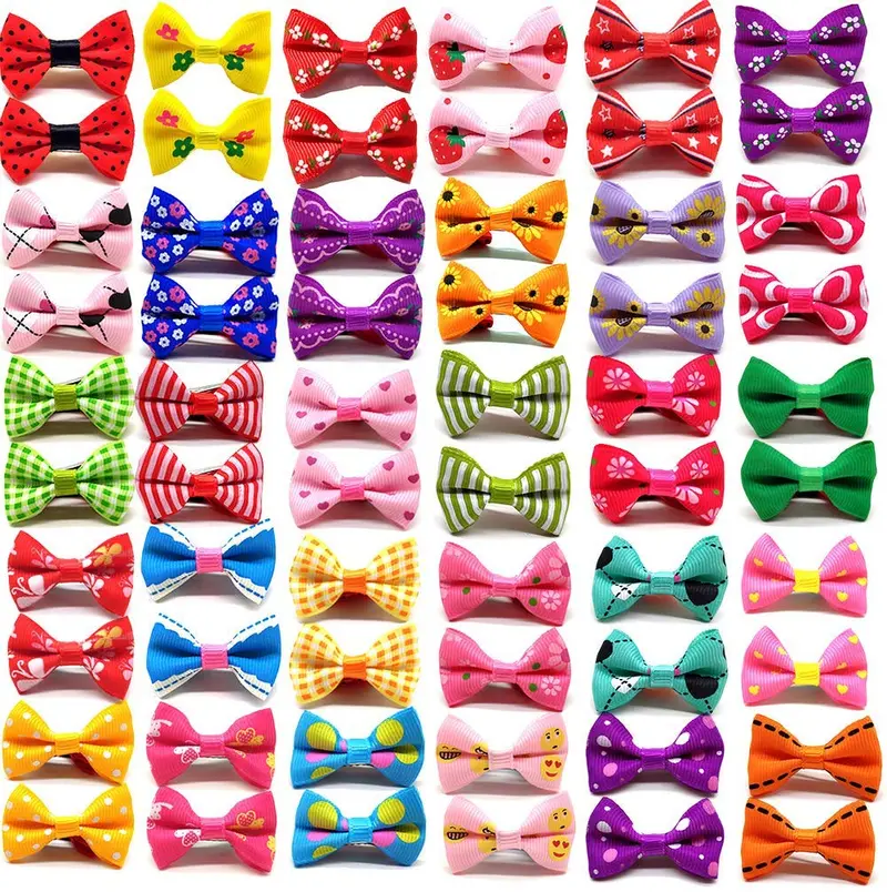 yagopet 50pcs/25pairs Nueva Puppy Dog – Clips de pelo Bowknot Pequeño con Tiny Alligator Clips Pet Grooming Productos Mix Colores varía patrones lazos de pelo de mascotas perro accesorios